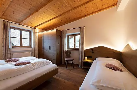 Una camera da letto dell'appartamento Zenzi