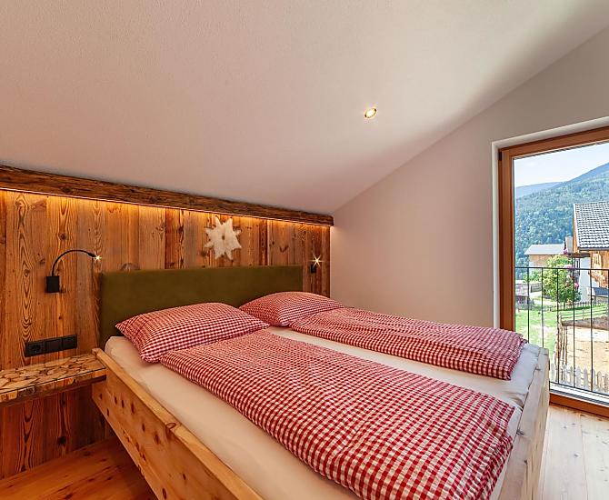 Doppelbett und französischer Balkon