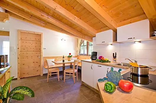 La cucina abitabile dell'appartamento Renon