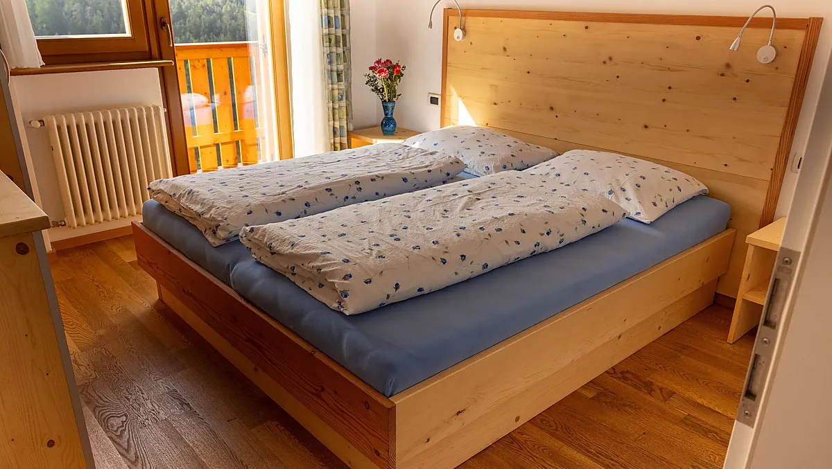 Camera da letto dell’appartamento vacanze “Fanes”