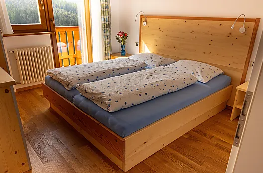 Camera da letto dell’appartamento vacanze “Fanes”