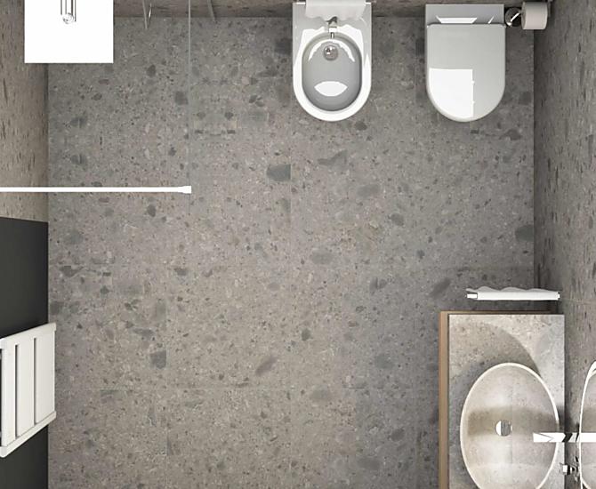 Geräumiges Badezimmer mit offener Dusche, WC, Bidet, Heizkörper und Kosmetikspiegel.